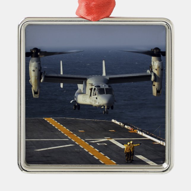 A V-22 Osprey aircraft prepares to land Metal Ornament (Front)