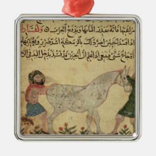 A veterinarian helping a mare to give birth metal ornament