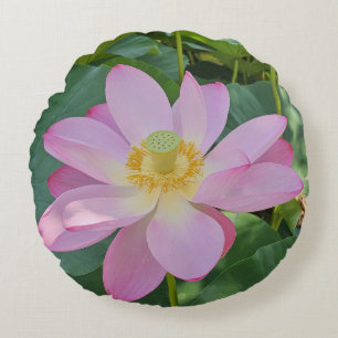 A vibrant lotus flower round pillow