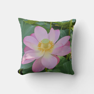 A vibrant lotus flower throw pillow