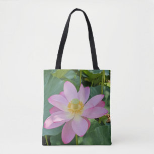 A vibrant lotus flower tote bag