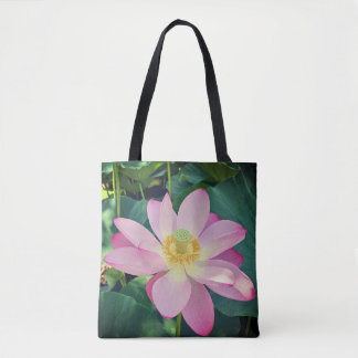 A vibrant lotus flower tote bag