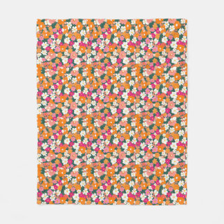 A vibrant pattern of small, colorful flowers fleece blanket