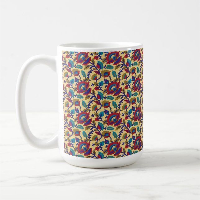 A vibrant textile art piece featuring bold red, ye coffee mug (Left)