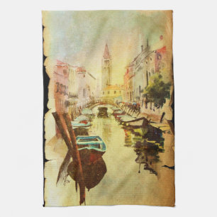 A View Of The Canal With Boats And Buildings Kitchen Towel