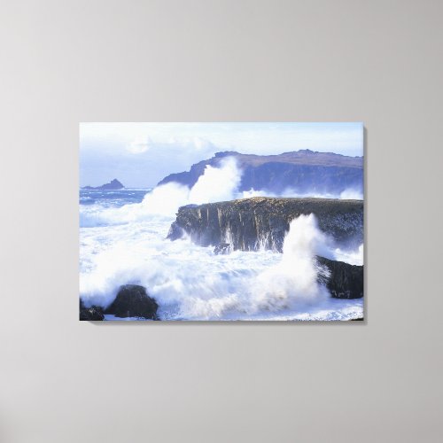 a view of the waves crashing against rocks canvas print