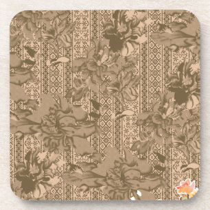 A vintage floral pattern with intricate brown desi beverage coaster