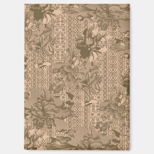 A vintage floral pattern with intricate brown desi magnet