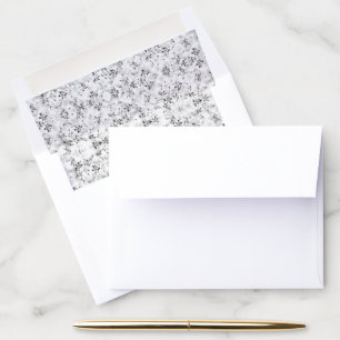 A visually striking white and black patterned wall envelope liner