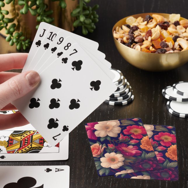 A wallpaper with a floral pattern  poker cards (In Situ)