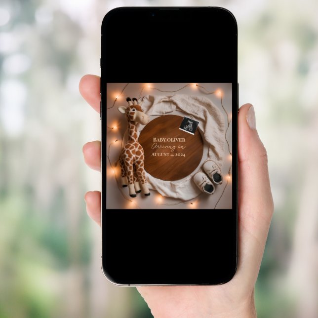 A warm cozy giraffe pregnancy announcement  (Front Digital)