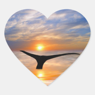 A whales tail at sunset heart sticker