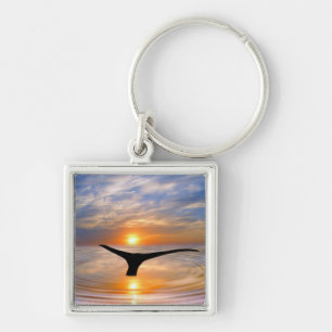 A whales tail at sunset keychain