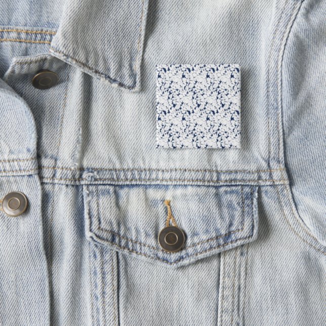 a white and blue background with a pattern button (In Situ)