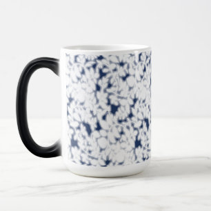 a white and blue background with a pattern color morph mug