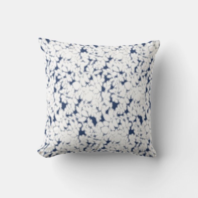 a white and blue background with a pattern throw pillow (Front)