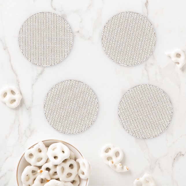 a white background with a brown pattern on it coaster set (In Situ)