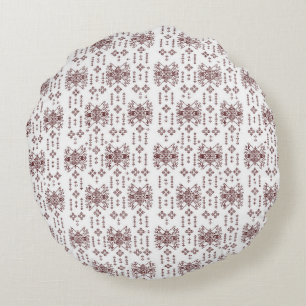  a white background with a red pattern on it round pillow