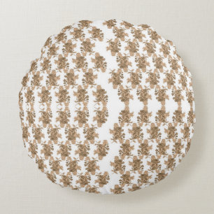 a white background with brown flowers on it round pillow
