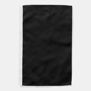 A white clock displayed prominently against a soli garden flag