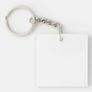 A white, equilateral triangle centered on a plain  keychain