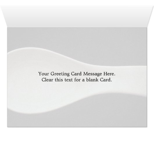 A white porcelain spoon (Inside Horizontal (Bottom))