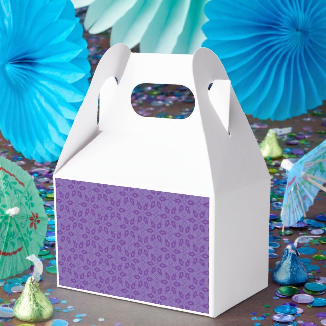 A white wrapping paper with a repeating pattern of favor boxes (Party)