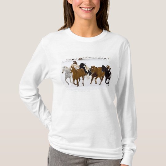 A winter scenic of running horses on The T-Shirt