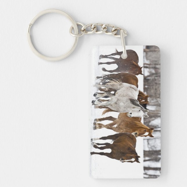A winter scenic of running keychain (Front)