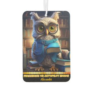 A wise owl surrounded by books in a cozy library air freshener