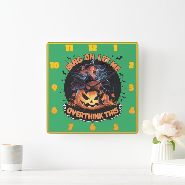 A witch playfully pondering atop a pumpkin square wall clock (Home)