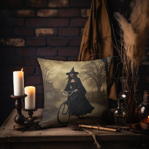 A Witch Riding a Bike Throw Pillow