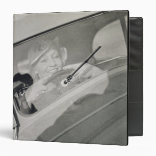 A woman driving, c.1930s (photogravure) binder