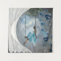 A woman in a blue dress on a swing