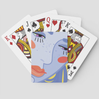 a woman's face with a bright lipstick. poker cards
