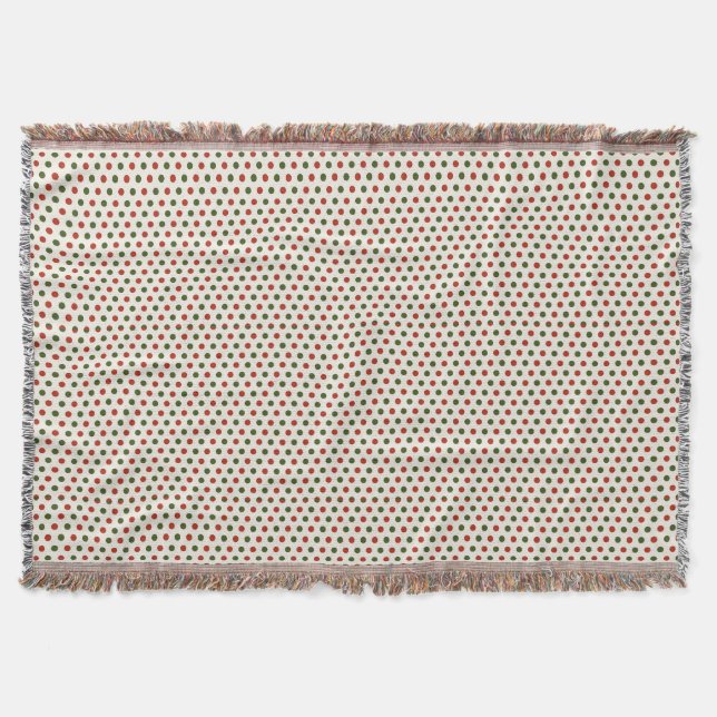 A woven blanket with a red and green polka dot  (Front)