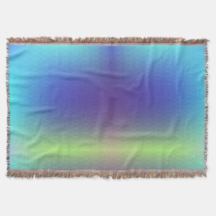 A woven colorful gradient blanket with a smooth 