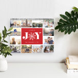 A Year of Joy | Photo Calendar<br><div class="desc">Share a favorite memory on each page of this photo calendar, with photos framed with a Nordic inspired sweater pattern in seasonal colors. Cover features a thumbnail version of each photo with "a year of joy" in the center in festive red lettering. A red snowflake takes the place of the...</div>