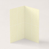 a yellow and white background with small circles (Inside)