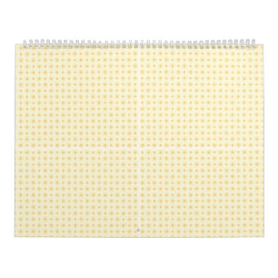 a yellow and white background with small circles calendar