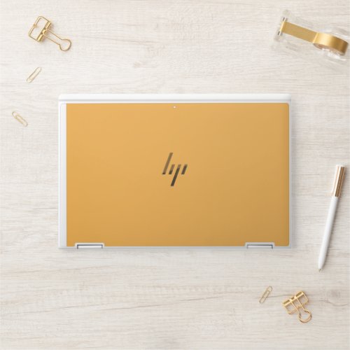 a yellow background with a black border HP laptop skin