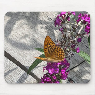 A yellow butterfly mouse pad