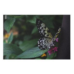 A Yellow Butterfly on Pink Flowers Faux Canvas Print