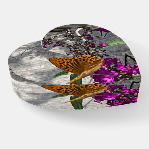 A yellow butterfly paperweight