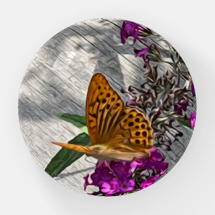 A yellow butterfly paperweight