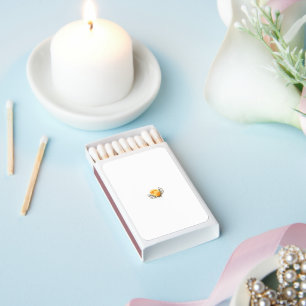 a yellow flower with leaves on a white background matchboxes