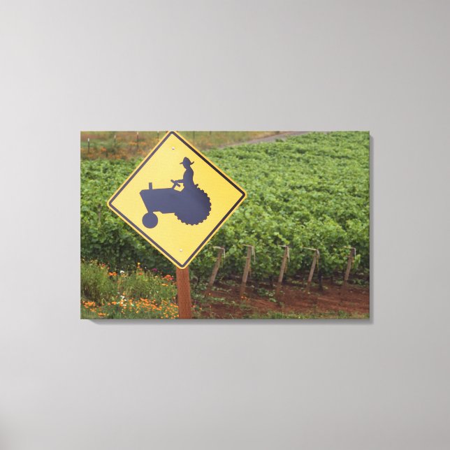 A yellow tractor crossing sign in the vineyard (Front)