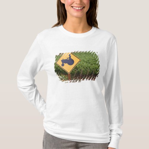 A yellow tractor crossing sign in the vineyard T_Shirt