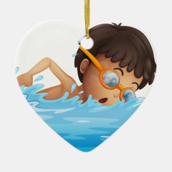 A Young Boy Swimming With A Yellow Goggles Ceramic Ornament by GraphicsRF at Zazzle