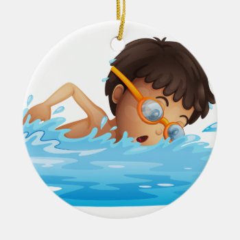A Young Boy Swimming With A Yellow Goggles Ceramic Ornament by GraphicsRF at Zazzle